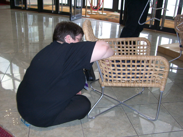 Alison Scott assembling a chair