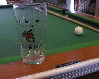 Pint glass on pool table